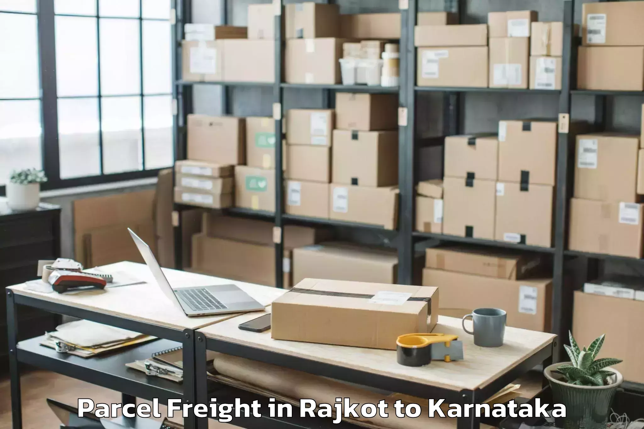 Rajkot to Karnataka State Law University Parcel Freight